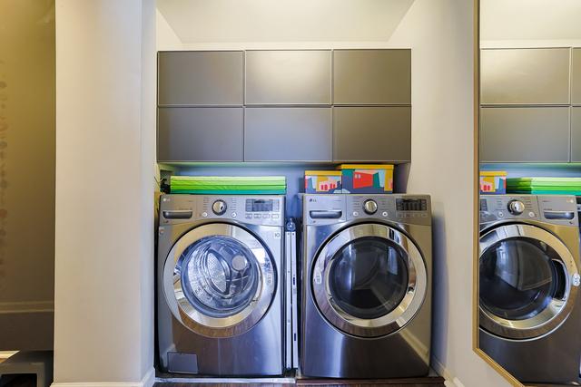 laundry area featuring washer and dryer and laundry area