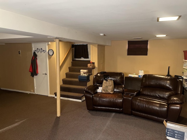 cinema room featuring carpet flooring and baseboards