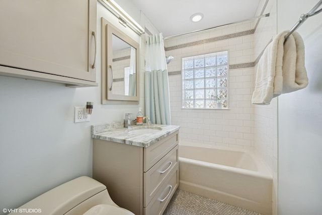 full bathroom with shower / bath combo, vanity, toilet, and tile patterned floors