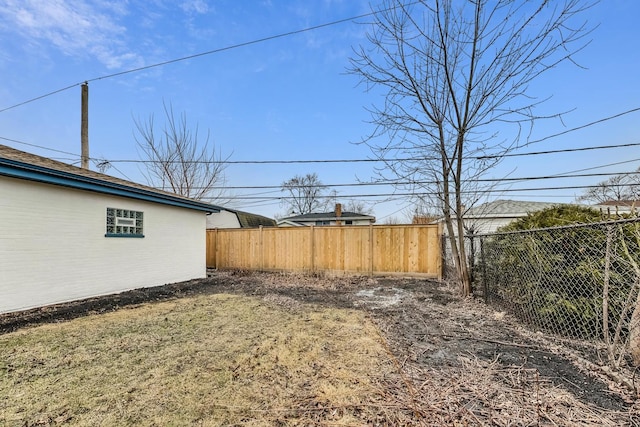 view of yard with fence