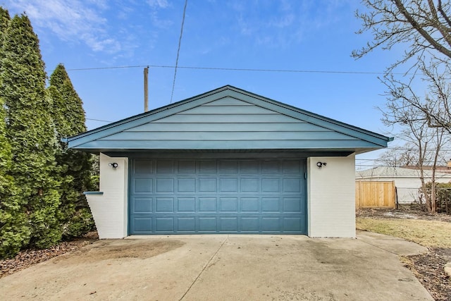 detached garage with fence