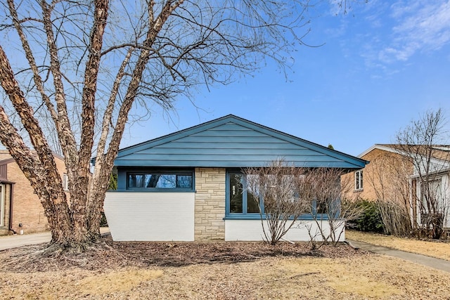 view of property exterior featuring stone siding