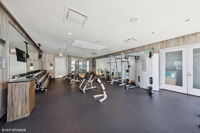 gym with french doors