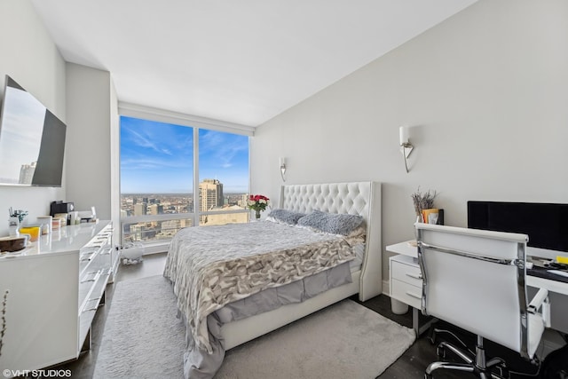 bedroom featuring a wall of windows