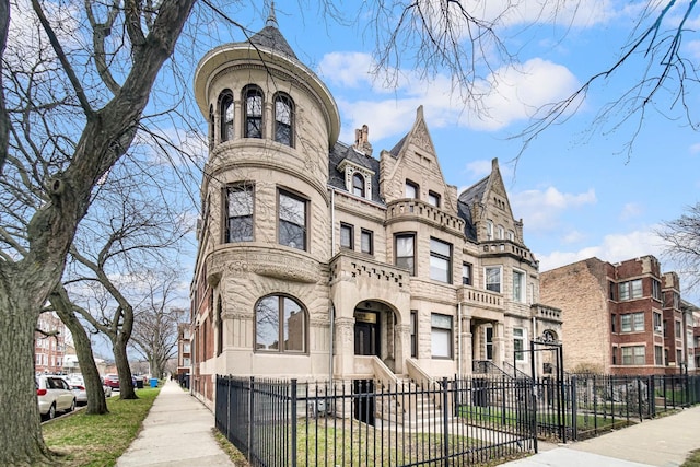 view of property with a fenced front yard