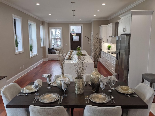 dining area with recessed lighting, dark wood-type flooring, baseboards, and ornamental molding