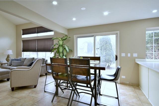 dining area with baseboards, light tile patterned flooring, and recessed lighting