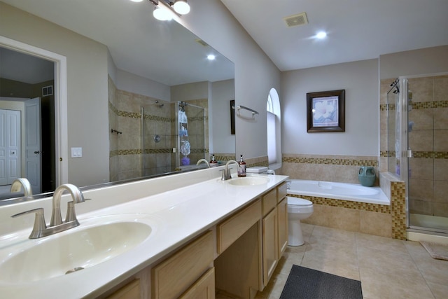 bathroom featuring a shower stall, visible vents, a sink, and tile patterned floors