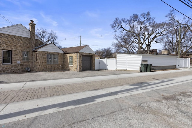 view of street featuring a gate