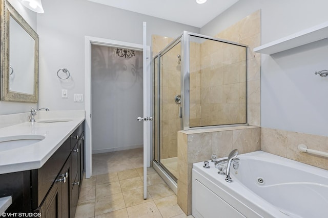 full bath with double vanity, a stall shower, a jetted tub, tile patterned flooring, and a sink