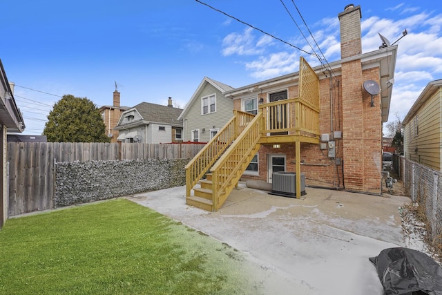 view of playground with a yard, a fenced backyard, and cooling unit