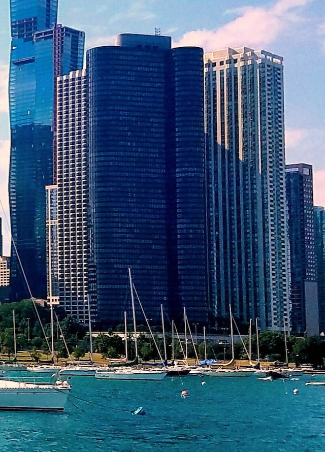 exterior space with a view of city and a water view