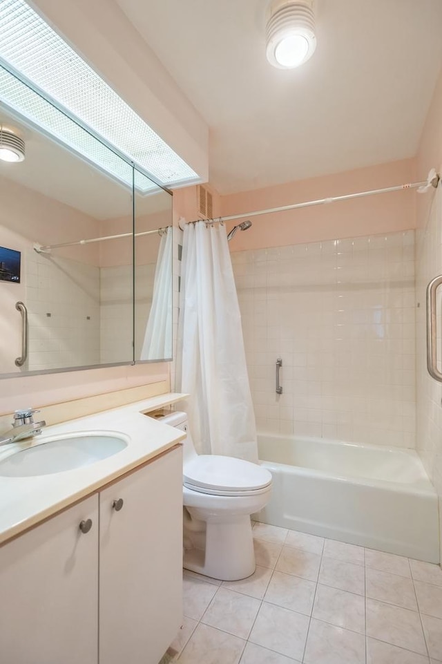 bathroom with tile patterned flooring, toilet, vanity, and shower / bathtub combination with curtain