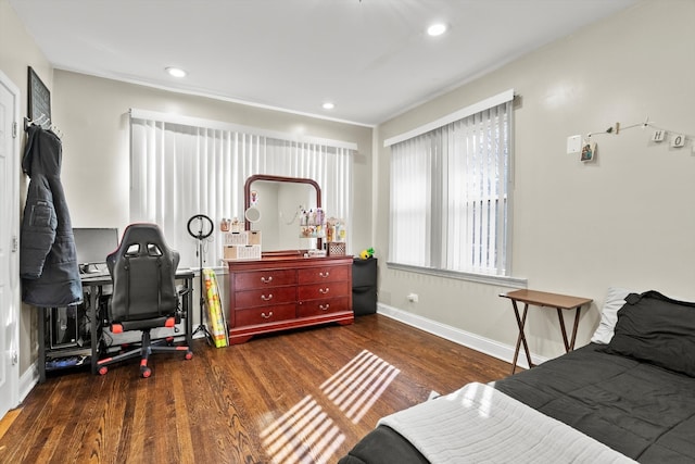 bedroom with recessed lighting, baseboards, and wood finished floors