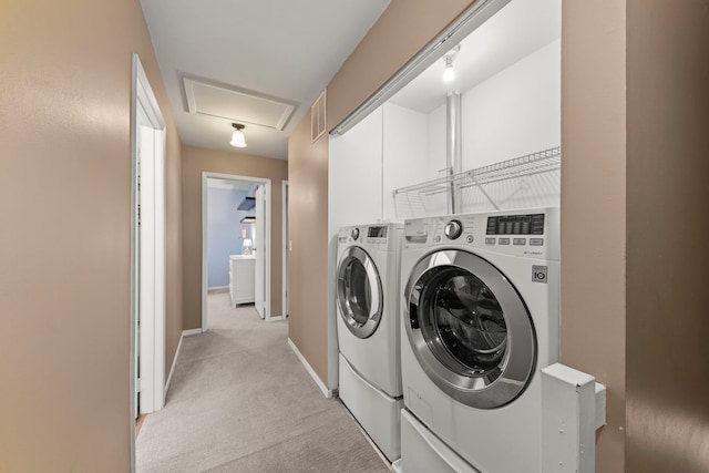 laundry room featuring light carpet, laundry area, visible vents, baseboards, and independent washer and dryer