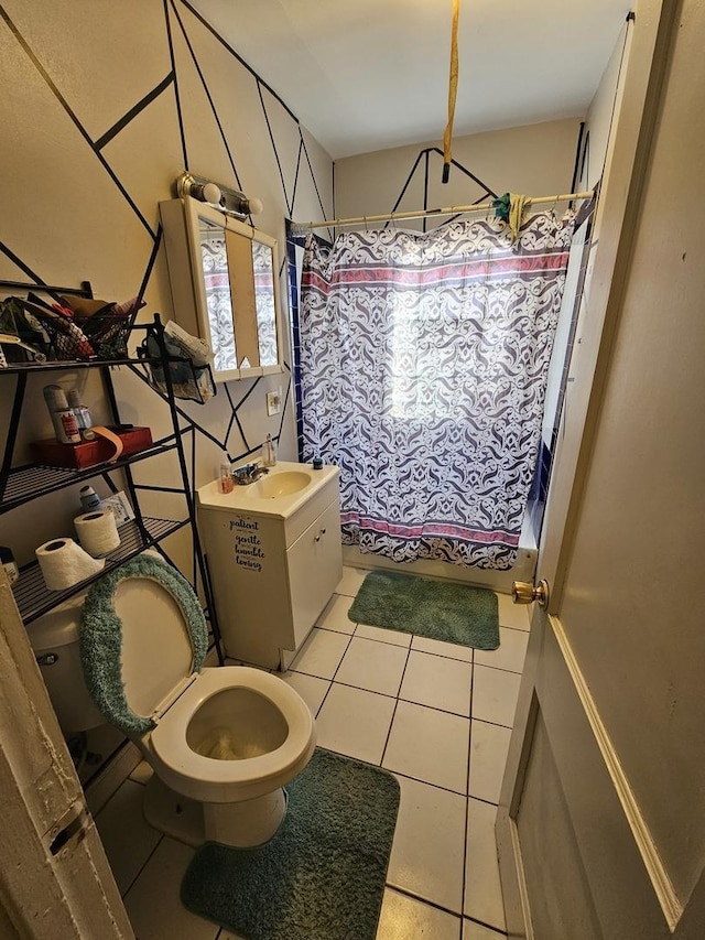 full bathroom featuring toilet, tile patterned flooring, shower / bath combination with curtain, and vanity