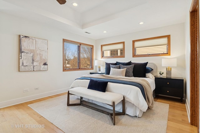 bedroom with recessed lighting, light wood-style flooring, visible vents, and baseboards