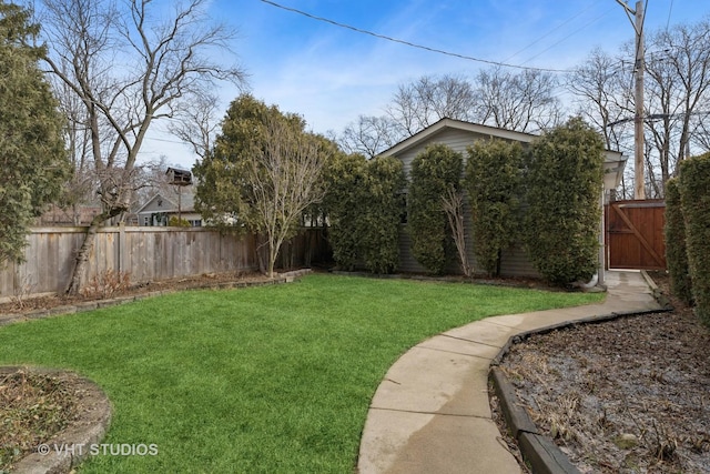 view of yard with a gate and fence