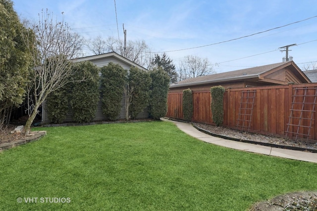 view of yard with fence