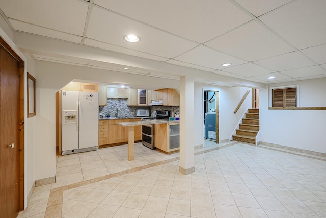 kitchen with backsplash, double oven range, light countertops, white refrigerator with ice dispenser, and light tile patterned flooring