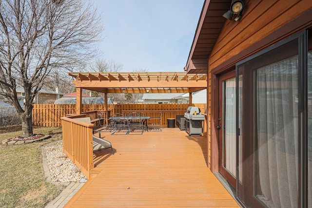 wooden deck featuring outdoor dining space, area for grilling, a pergola, and fence