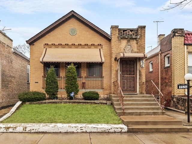 view of front of home with brick siding