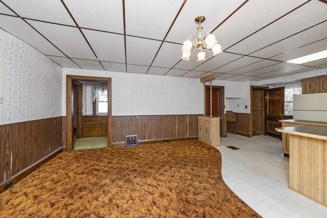 619 Lincoln St, Minonk, IL 61760 - interior space with visible vents, a wainscoted wall, wallpapered walls, a drop ceiling, and a chandelier