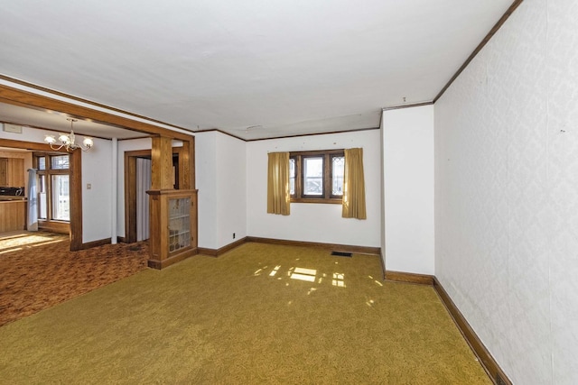 619 Lincoln St, Minonk, IL 61760 - interior space featuring a notable chandelier, baseboards, crown molding, and carpet
