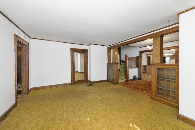 619 Lincoln St, Minonk, IL 61760 - unfurnished living room with visible vents, baseboards, carpet, and crown molding