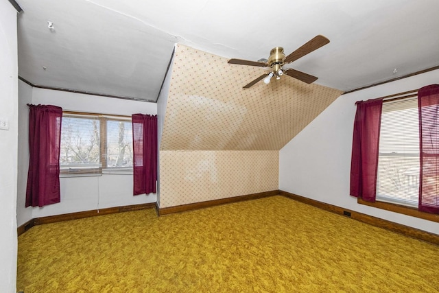 619 Lincoln St, Minonk, IL 61760 - additional living space featuring wallpapered walls, baseboards, ceiling fan, and vaulted ceiling