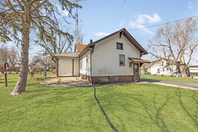 619 Lincoln St, Minonk, IL 61760 - view of home's exterior with a yard