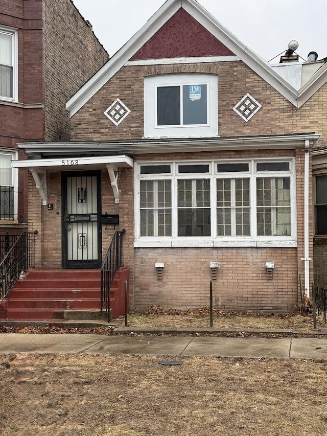 view of front of property with brick siding