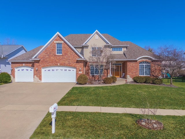 view of front facade featuring a shingled roof, concrete driveway, brick siding, and a front lawn