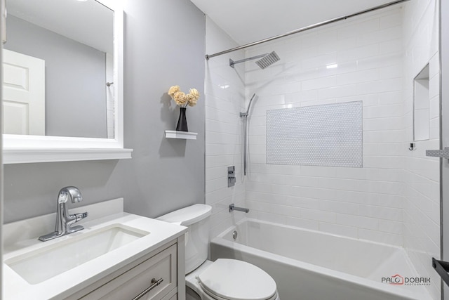 full bath with tub / shower combination, vanity, and toilet