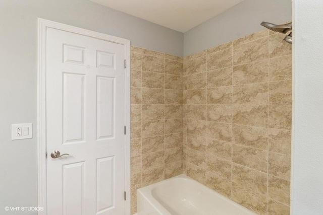 bathroom featuring shower / tub combination