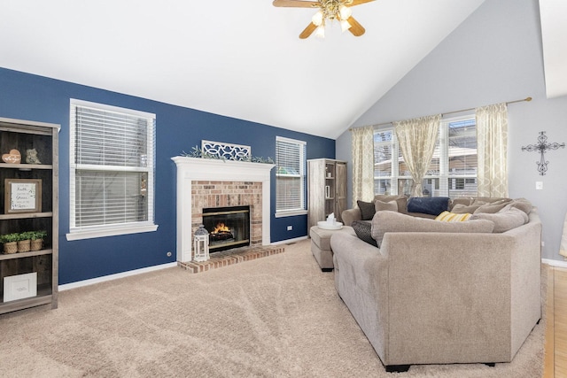 living area with a brick fireplace, baseboards, carpet flooring, high vaulted ceiling, and a ceiling fan