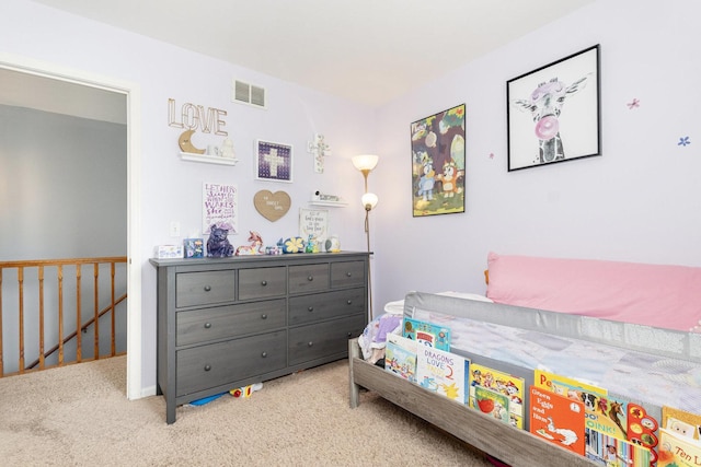 carpeted bedroom with visible vents