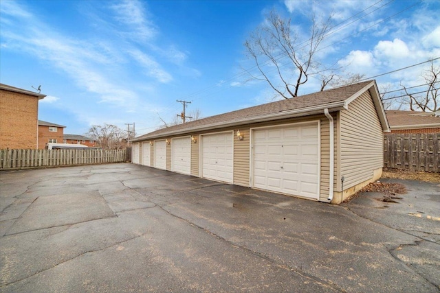 garage with fence