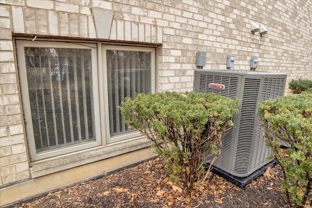 details with brick siding and central air condition unit