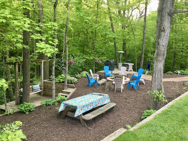 view of patio featuring a fire pit