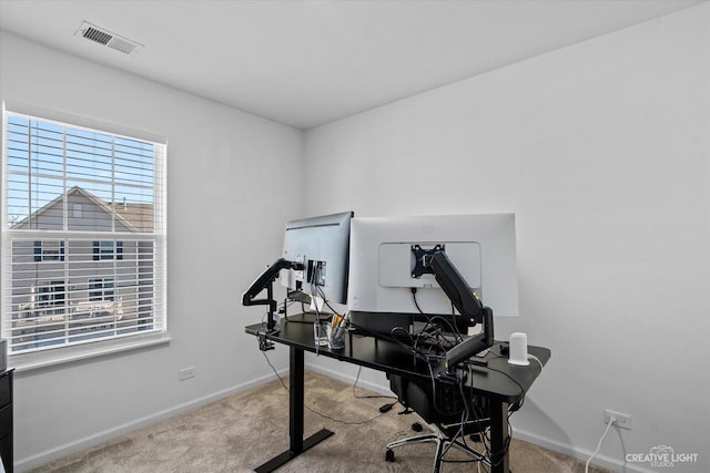 office with visible vents, carpet flooring, and baseboards