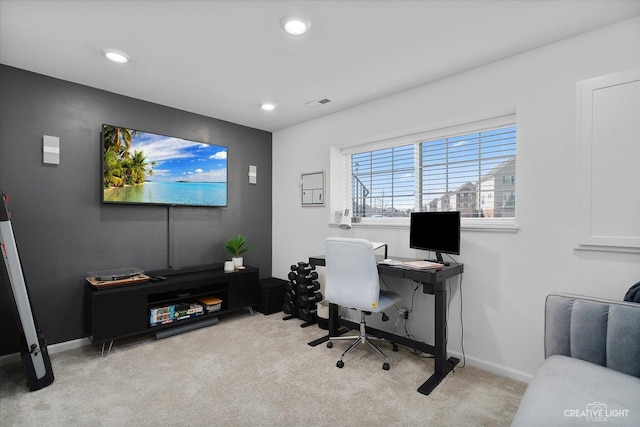 carpeted office space featuring baseboards, recessed lighting, and visible vents