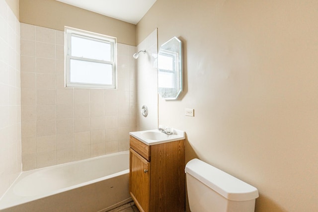 bathroom with toilet, shower / washtub combination, and vanity