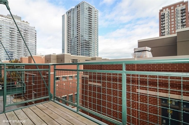 balcony featuring a city view