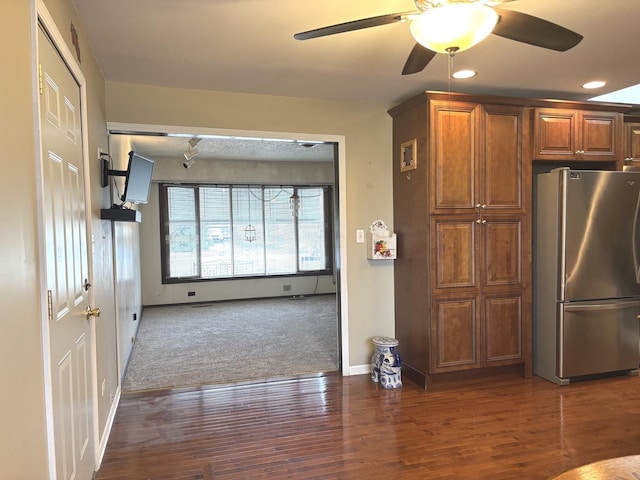 kitchen with baseboards, wood finished floors, freestanding refrigerator, carpet floors, and recessed lighting