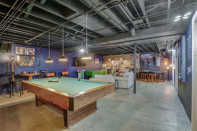 playroom featuring pool table, concrete floors, and a dry bar