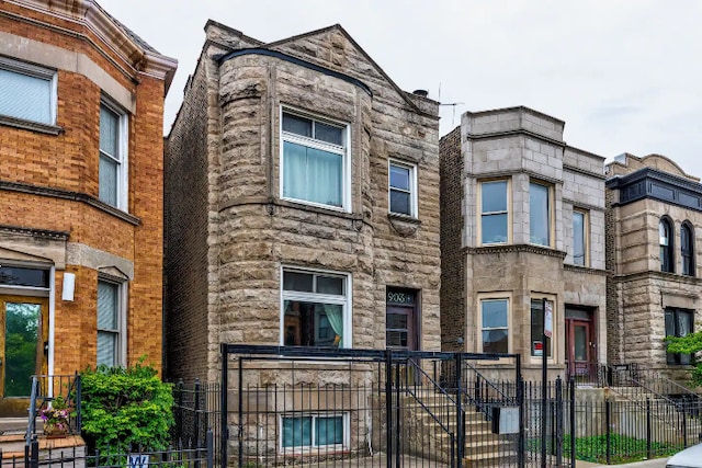 view of property featuring a fenced front yard