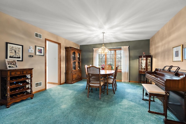 dining space with carpet floors, baseboards, visible vents, and a chandelier