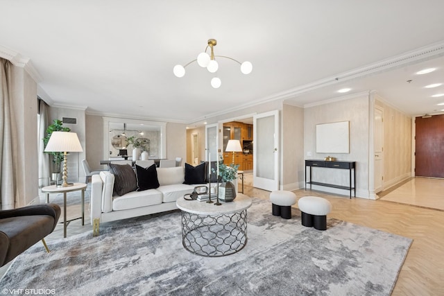 living area featuring crown molding, baseboards, and an inviting chandelier