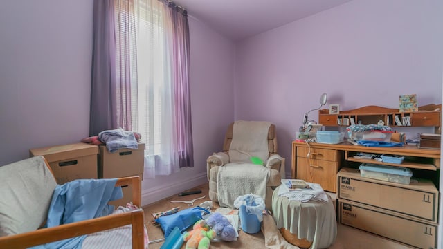 bedroom featuring baseboards